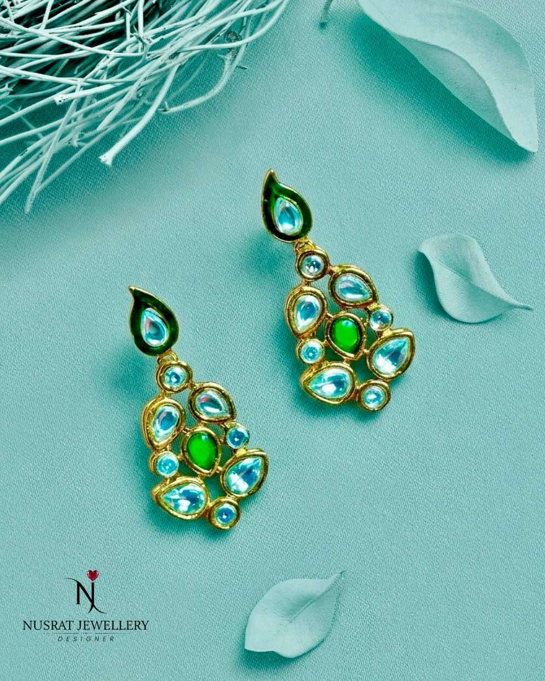 GOLDEN KUNDAN EARRINGS WITH EMERALD LEAF - Nusrat Jewellery